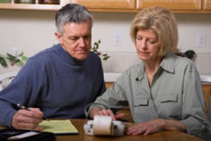 couple checking bills